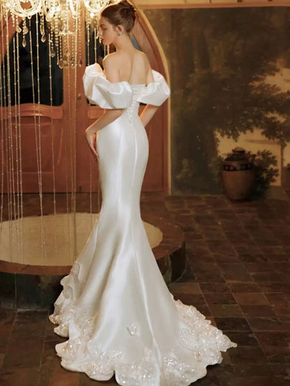 Trumpet/Mermaid Off-the-Shoulder Satin Wedding Dresses with Embroidery